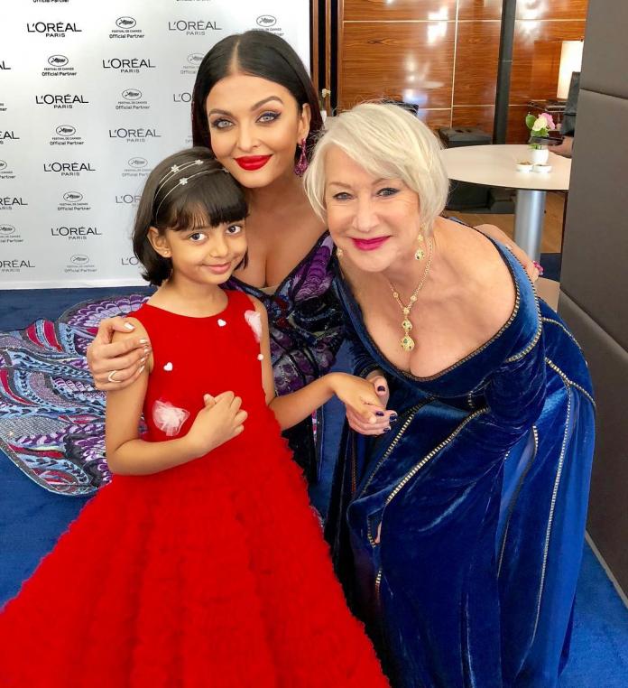 Aishwarya Rai Bachchan in hot-pink blazer steps out with Abhishek and Aaradhya in Cannes. New pics